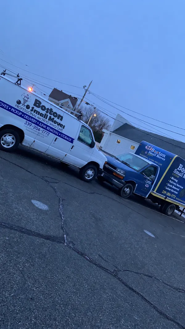 Boston Small Moves van and truck photographed at dusk
